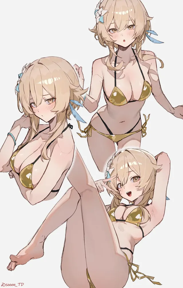Poses in a golden bikini